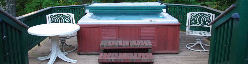 What benefits are derived from investing in a wooden hot tub